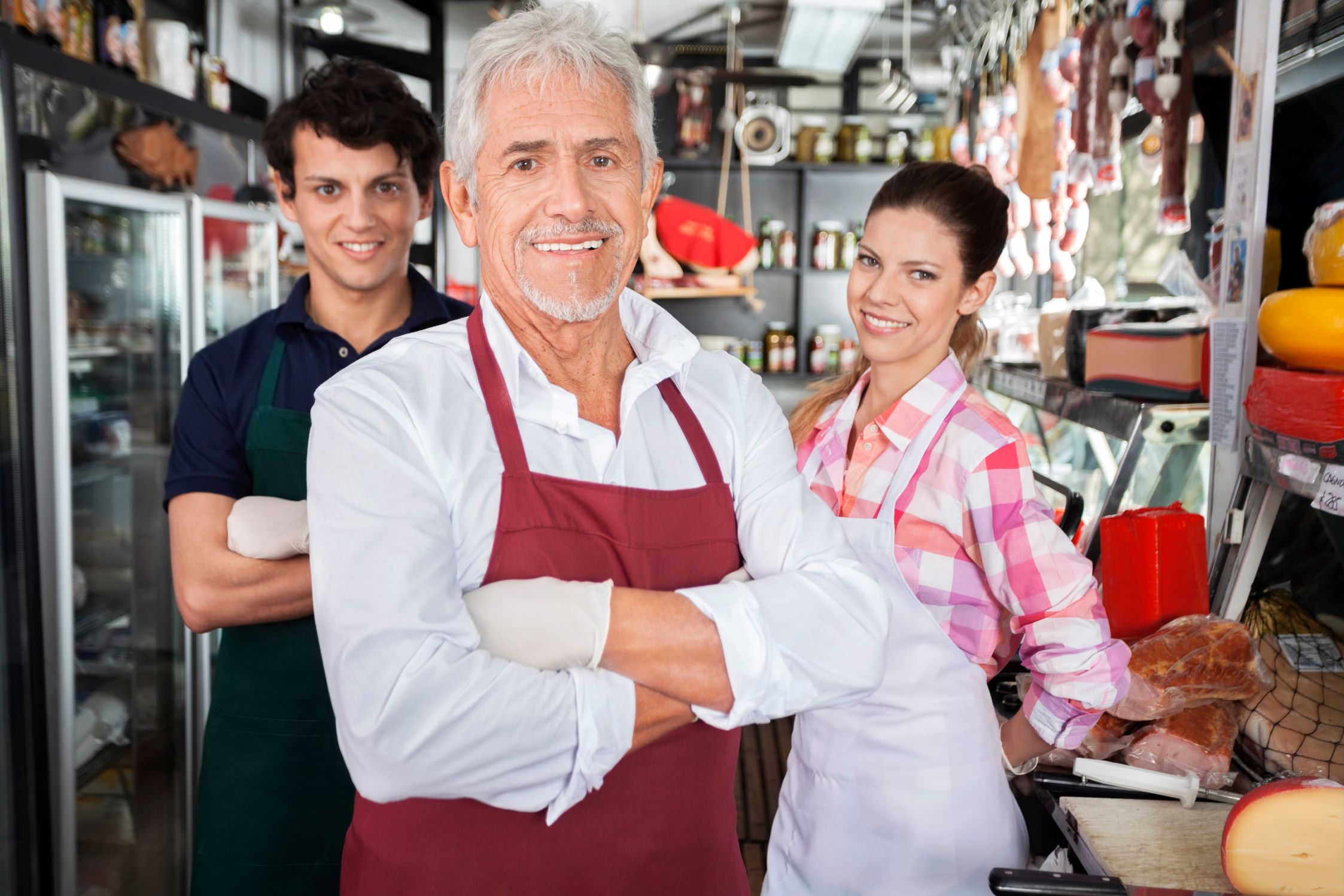 Owners of small family business specializing in meat and cheese.